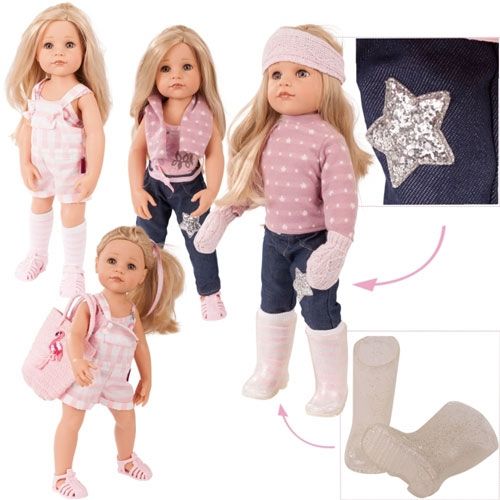 Gotz stapop Hannah in verschillende outfits, waaronder een roze geruite romper en een winterset met spijkerbroek en roze trui.