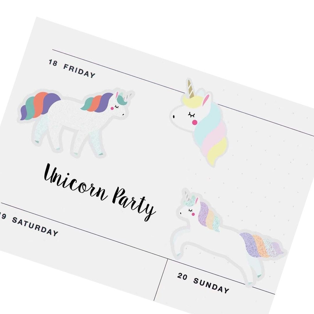 Drie eenhoorn gelstickers geplakt op een witte plannerpagina met de tekst 'Unicorn Party'.