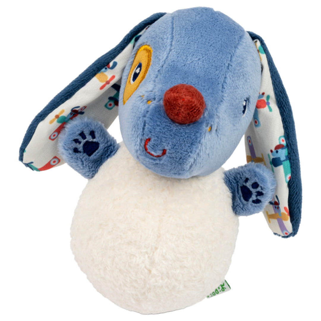 Lilliputiens muzieknuffel tuimelaar Jules de hond, een blauw-witte knuffel met patroonoren en zichtbare pootjes, staat recht van voren.