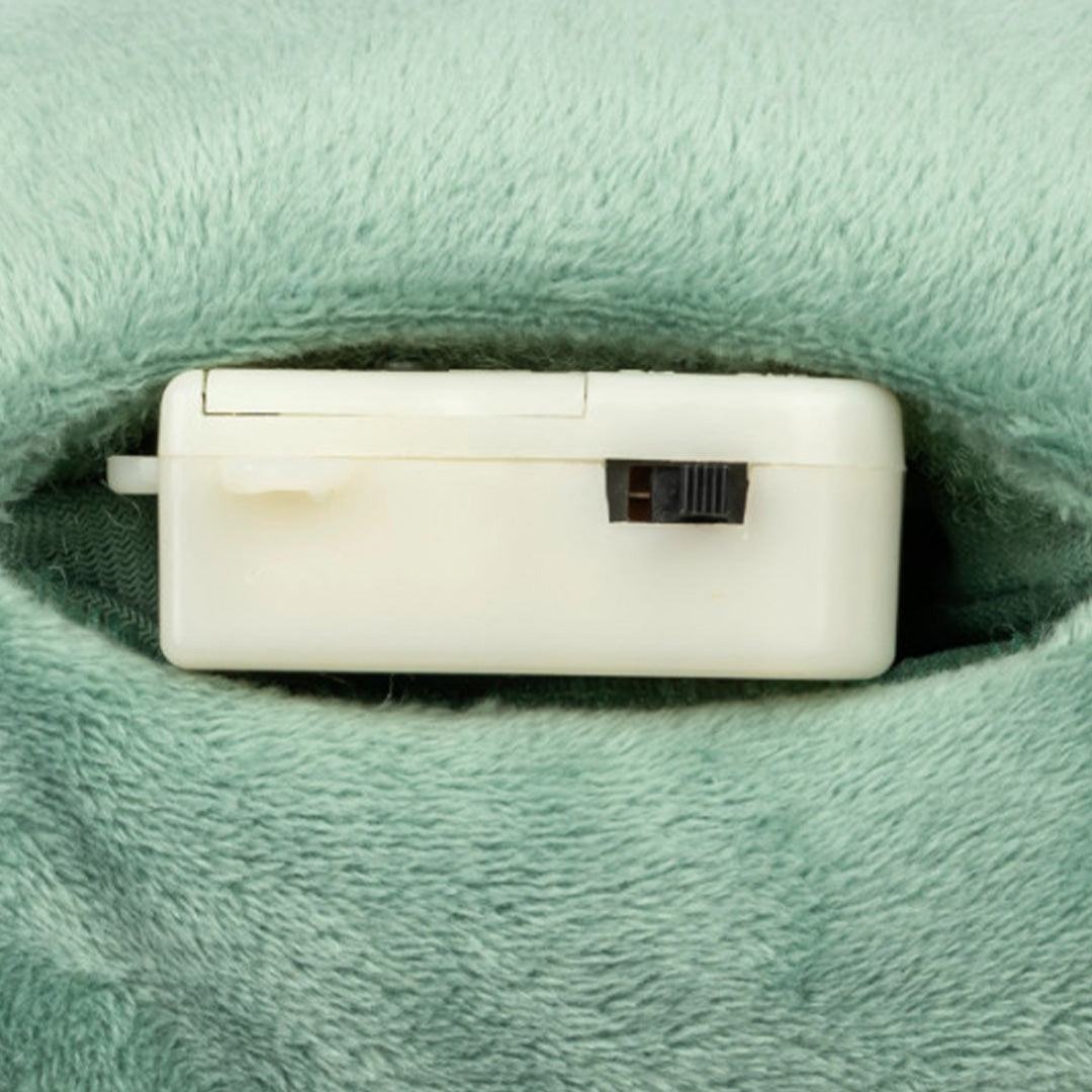 Detail van het batterijvakje met aan/uit-schakelaar in de groene activiteitenradio.