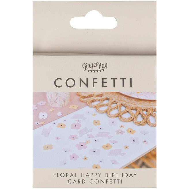 Verpakking van Ginger Ray confetti met bloemen en 'Happy Birthday' tekst.