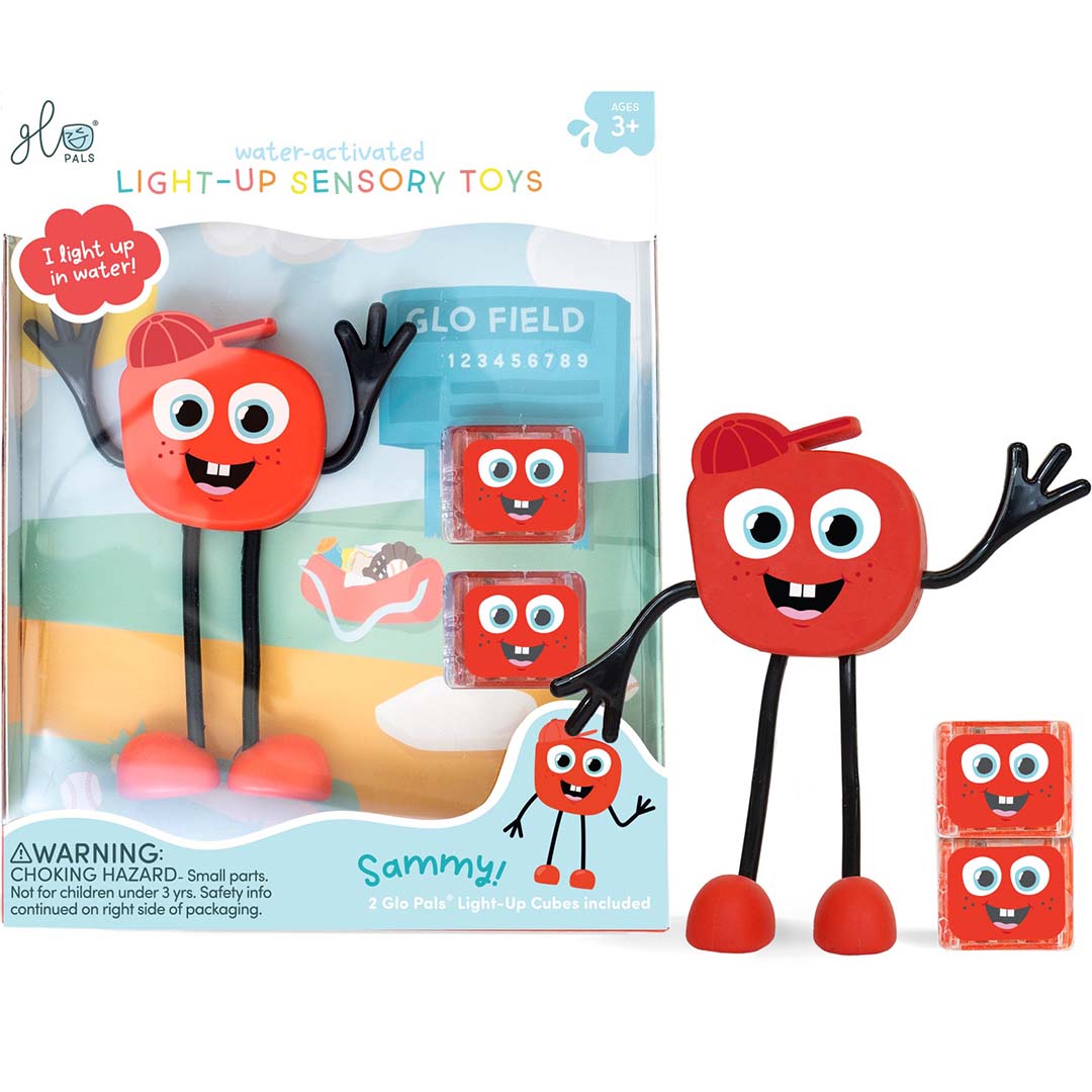 Verpakking van het glo pals lichtgevend badspeelgoed Sammy met de oranje figuur en twee lichtgevende blokjes ernaast.