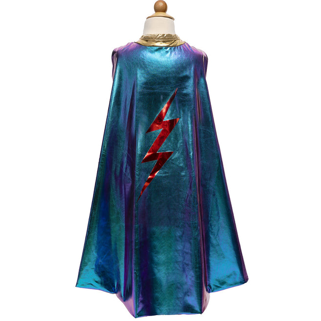Great Pretenders omkeerbare verkleedcape voor kinderen in iriserend blauw met een rode bliksem op een paspop.