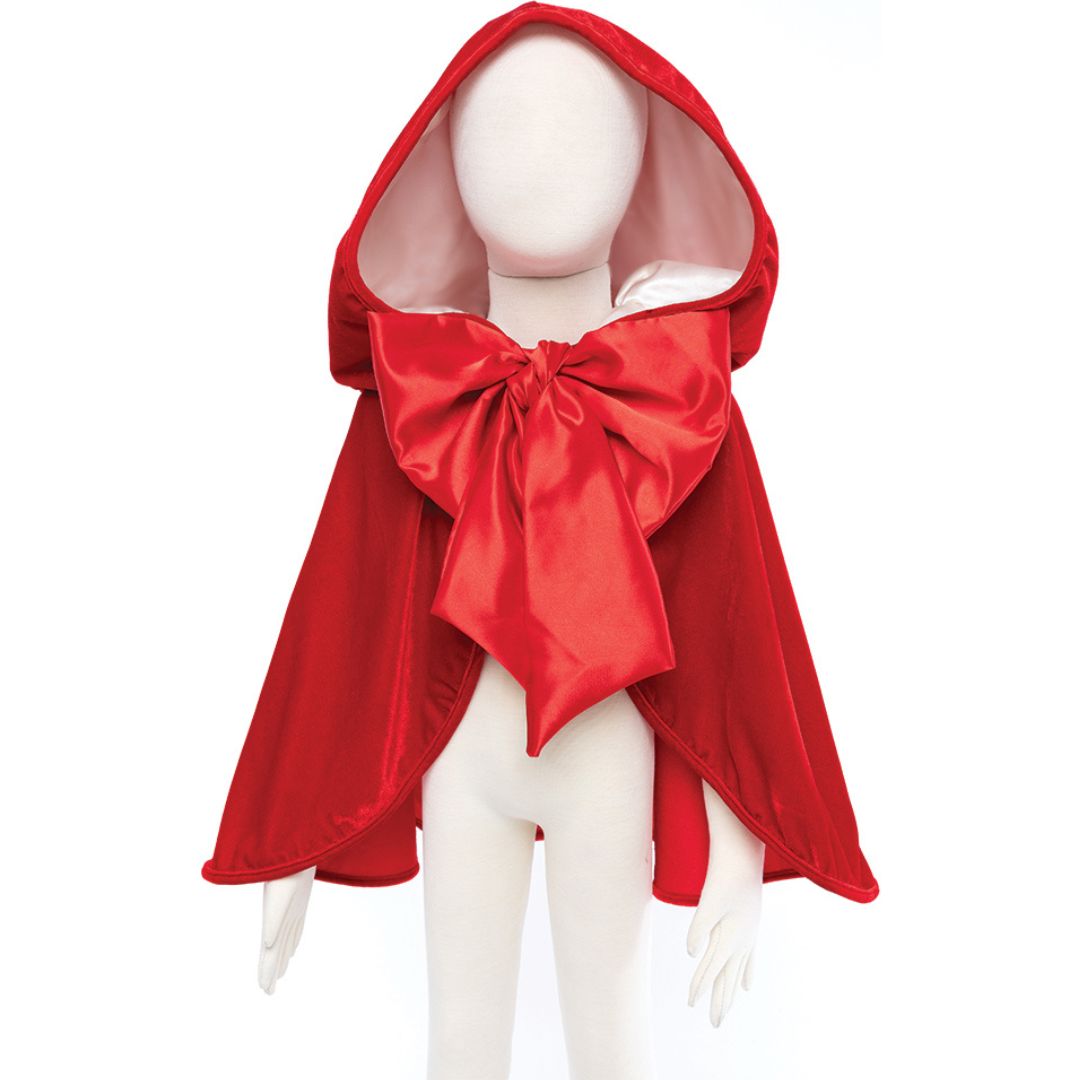 Great Pretenders Roodkapje verkleedcape met grote rode strik, getoond op een mannequin.