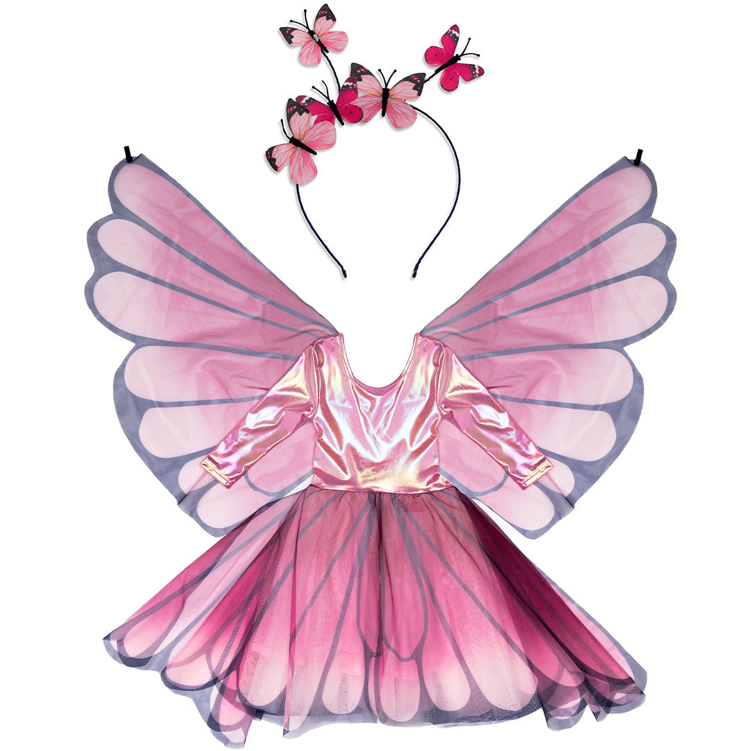 Great pretenders roze vlinder kostuumset met jurk, vleugels en diadeem, plat gefotografeerd.