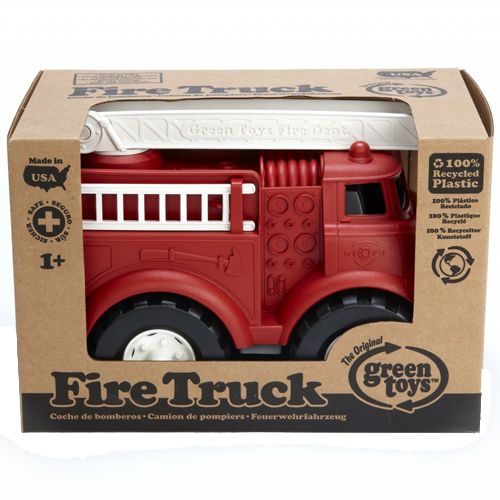 Verpakking van de Green Toys rode speelgoed brandweerwagen, met de truck zichtbaar in de kartonnen doos.