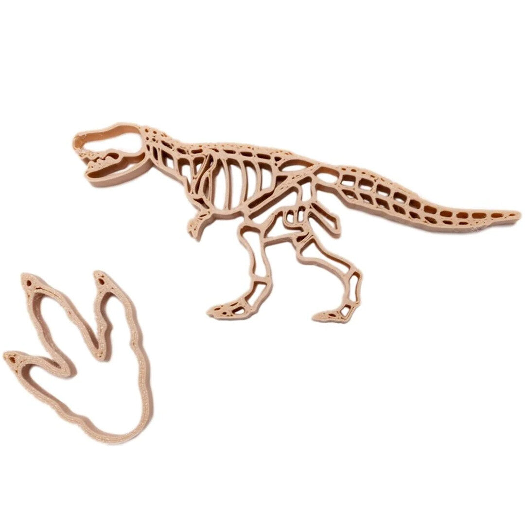 grennn houten uitsteekvormen van een dinoskelet en een dinopootafdruk.