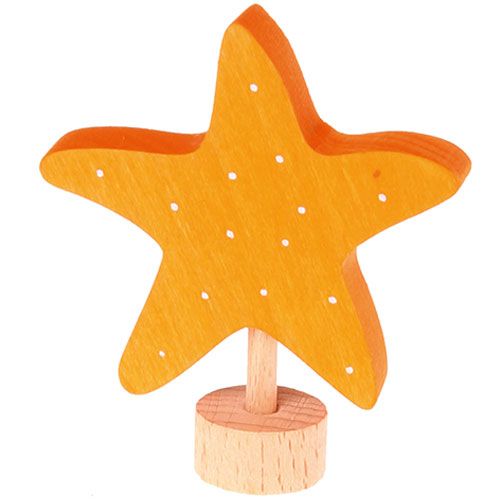 Grimm's oranje houten decoratie figuur in de vorm van een zeester met stippen.