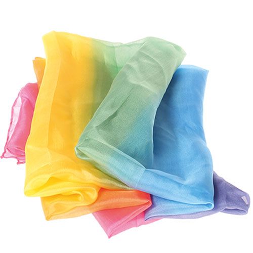 grimm's zijden speeldoeken in regenboogkleuren, op een hoopje.