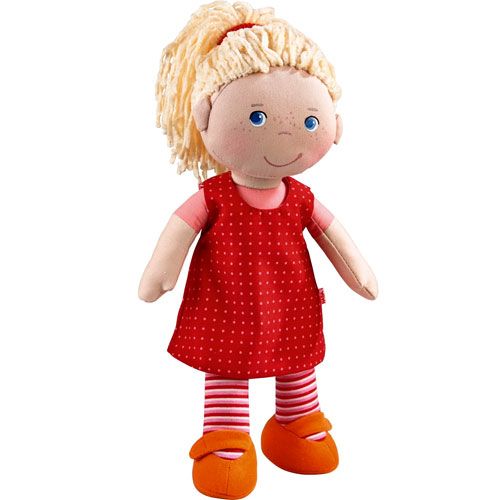 Haba lappenpop Annelie met blond haar, een rode jurk met stippen en gestreepte benen.