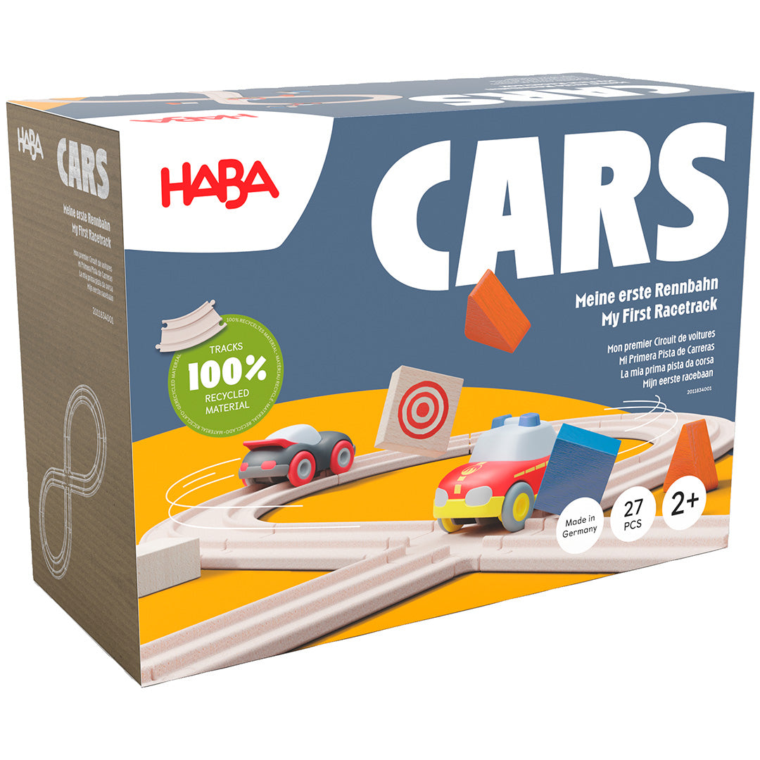 Verpakking van de Haba Cars speelgoedracebaan 'Mijn eerste racebaan' met twee autootjes en houten blokken.