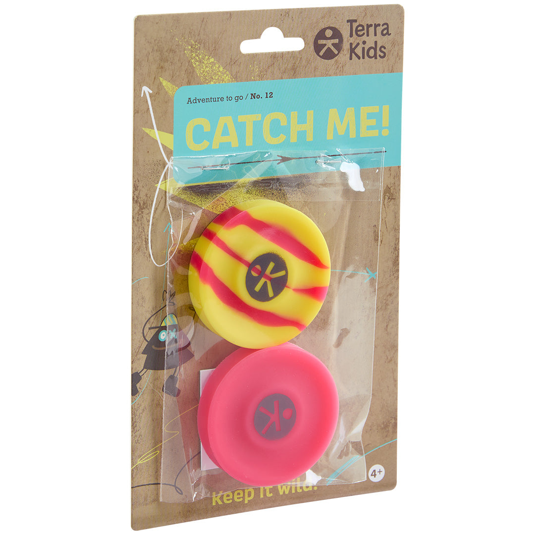 Verpakking van Haba Terra Kids mini frisbees, met een geel-rood gestreepte en een effen rode frisbee.