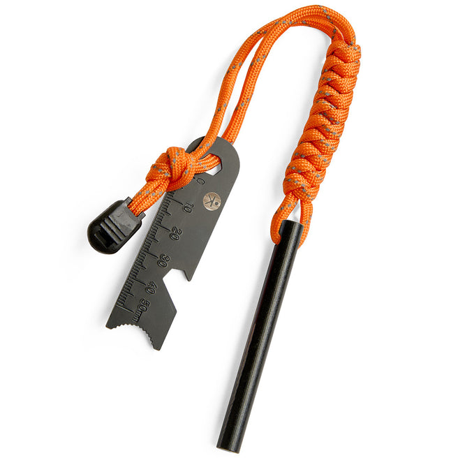 Haba Terra Kids kinder vuurstarter met oranje paracord en zwarte staaf en striker.