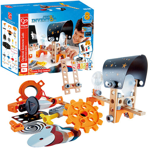 Hape bouwset optica laboratorium met de verpakking op de achtergrond.
