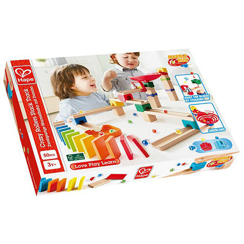 De verpakking van de Hape knikkerbaan met een afbeelding van spelende kinderen en de productnaam.