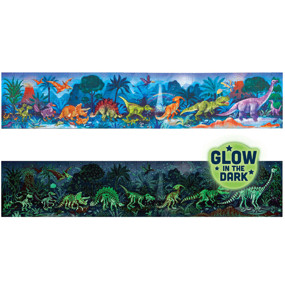 Hape dinosaurus legpuzzel van 1,5 meter lang, overdag en oplichtend in het donker, met het 'Glow in the Dark' logo.