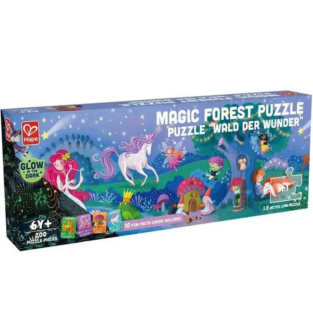 De verpakking van de Hape 'Magic Forest' vloerpuzzel met een illustratie van het magische bos en de tekst 'Glow in the Dark'.