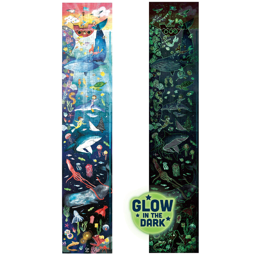 De Hape oceaan vloerpuzzel met zeedieren, zowel in kleur als oplichtend in het donker.