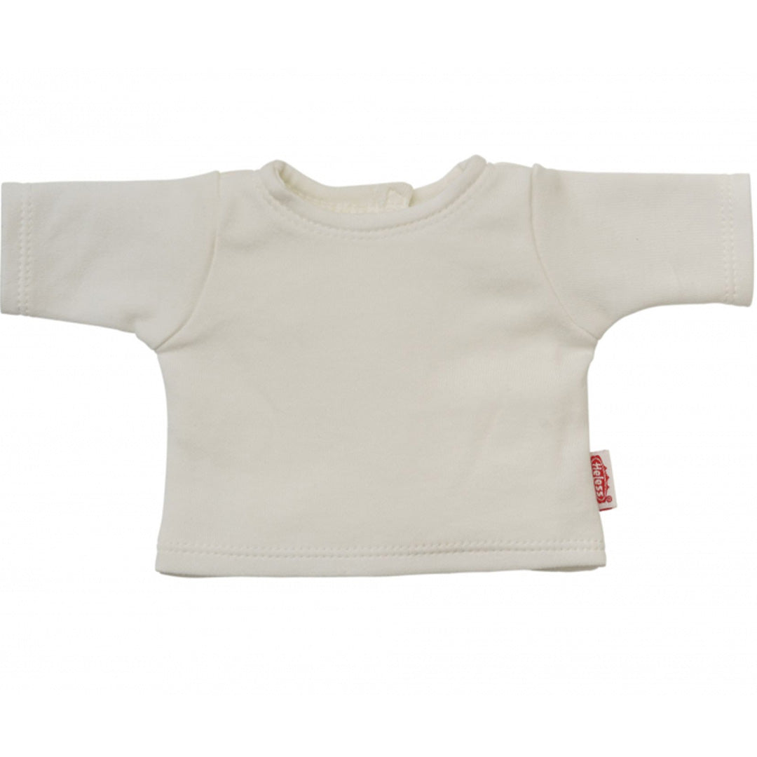 Een wit t-shirt van de heless poppenkleding set, plat gelegd.