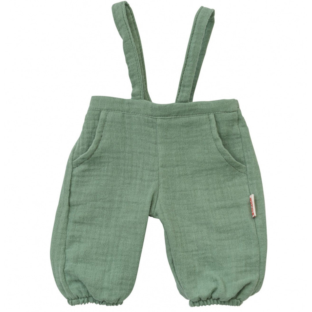 De saliegroene tuinbroek van de heless poppenkleding set, plat gelegd.