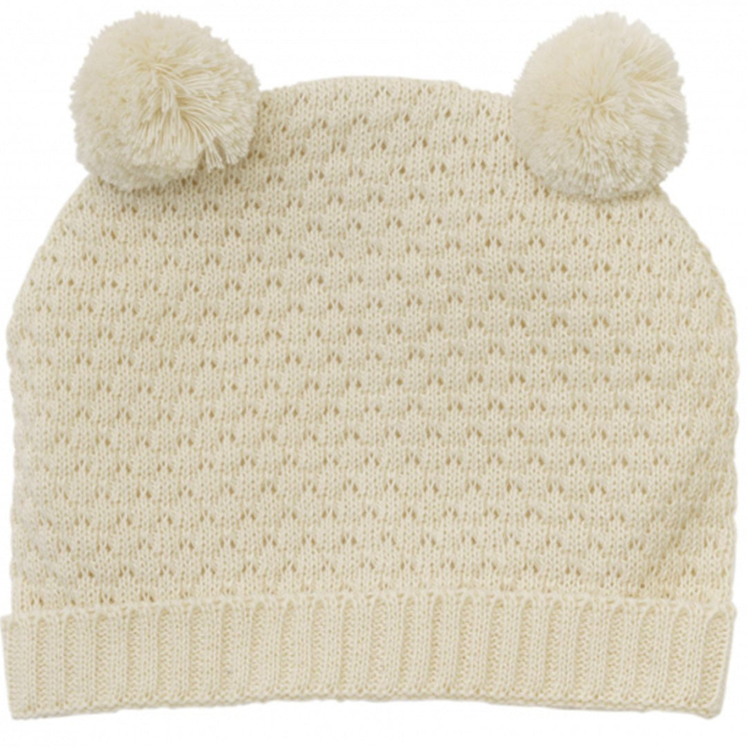 Heless gebreide beige poppenmuts met twee pompons.