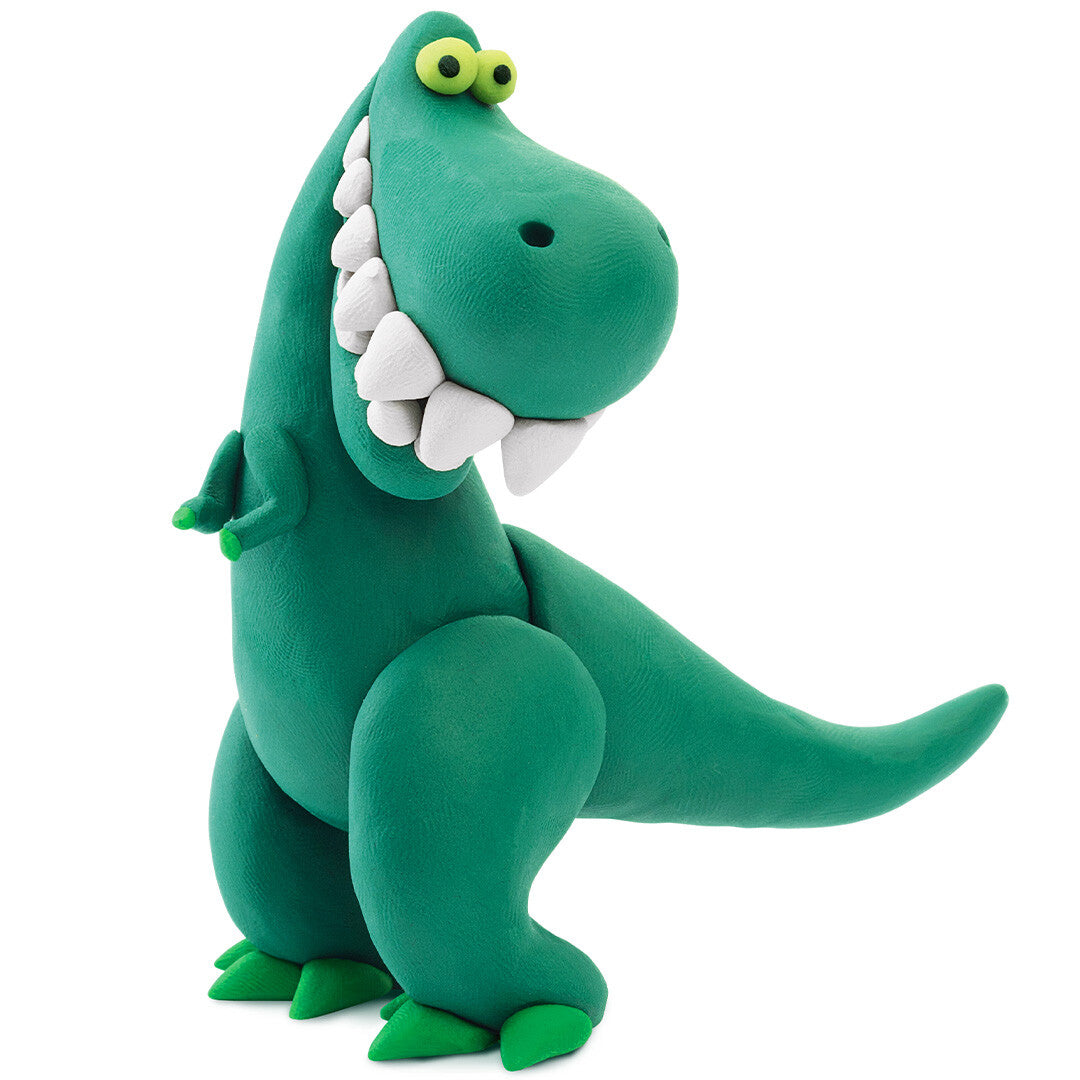 Een groene Hey Clay boetseerklei T-Rex met grote witte tanden.