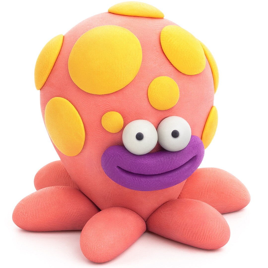 Detail van een roze Hey Clay boetseerklei octopus met gele stippen en een paarse mond.