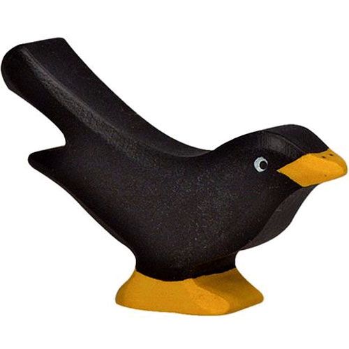 Holztiger houten dierenfiguur van een zwarte merel.