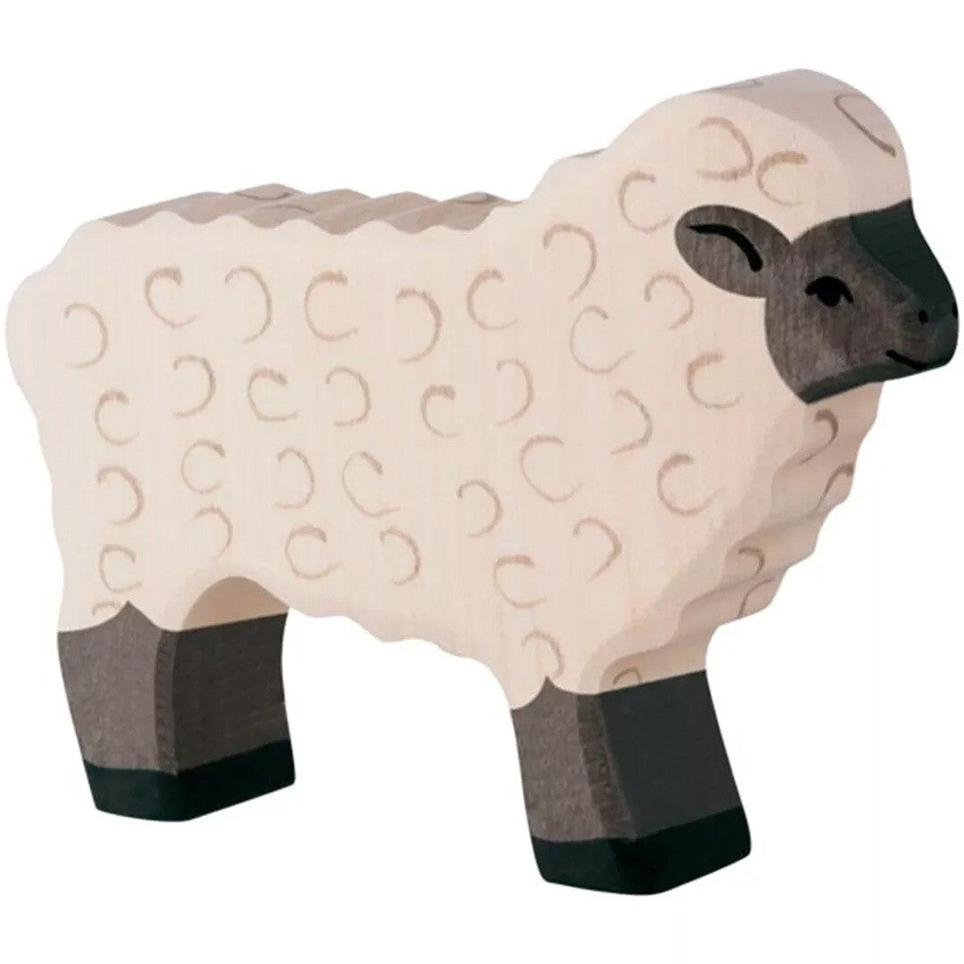 Holztiger houten dierenfiguur van een zwartkopschaap met beige lijf en donkere kop en poten.