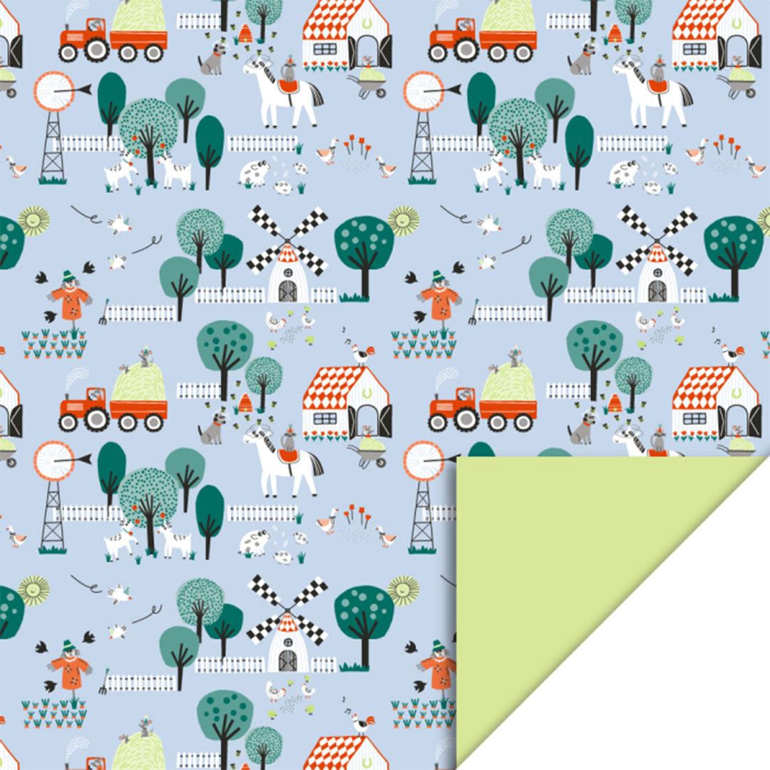 house of products inpakpapier met boerderijthema op blauwe achtergrond en een omgevouwen hoek die de limegroene achterkant toont.