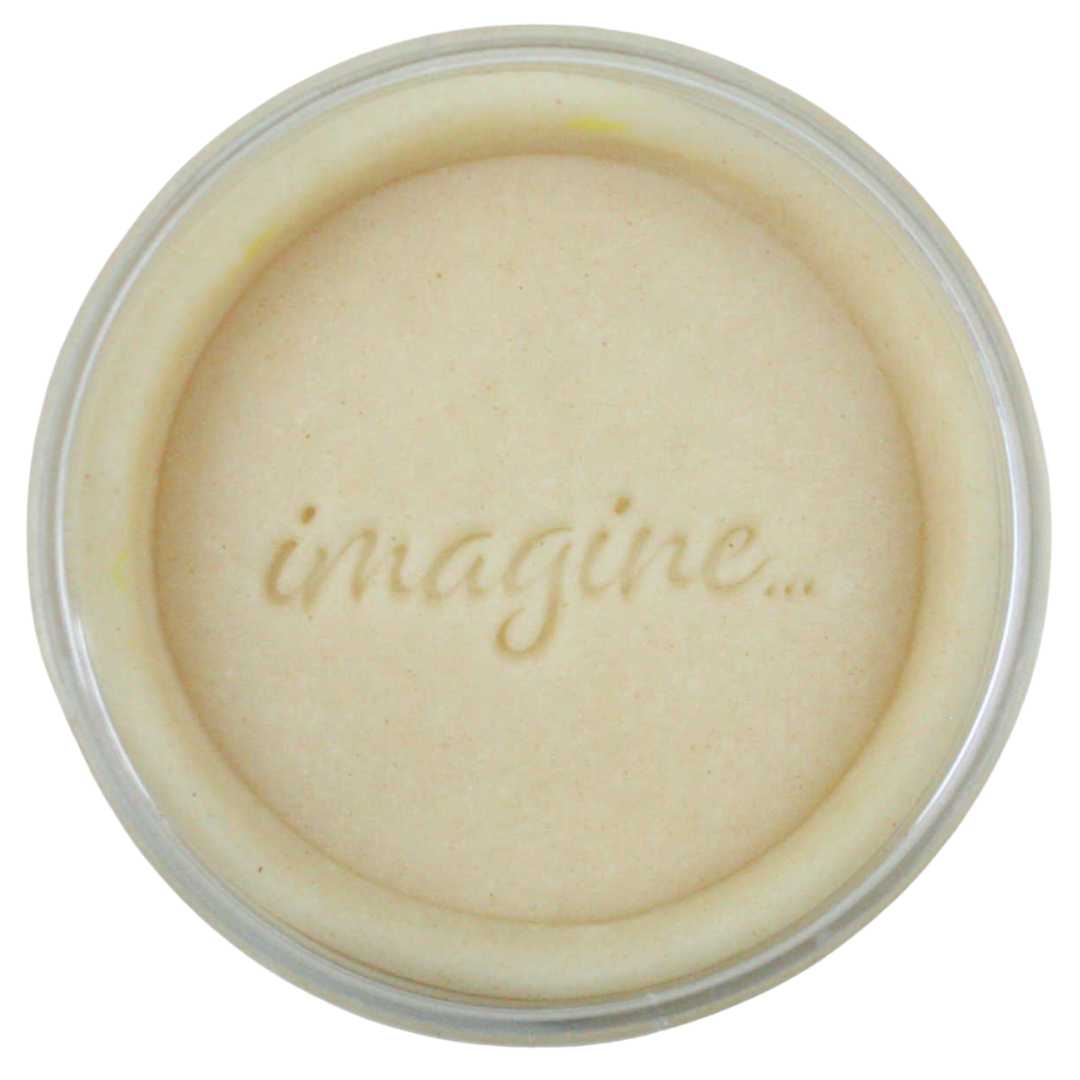 Invitation to imagine beige speelklei in een ronde verpakking met de tekst 'imagine...' erin gedrukt.