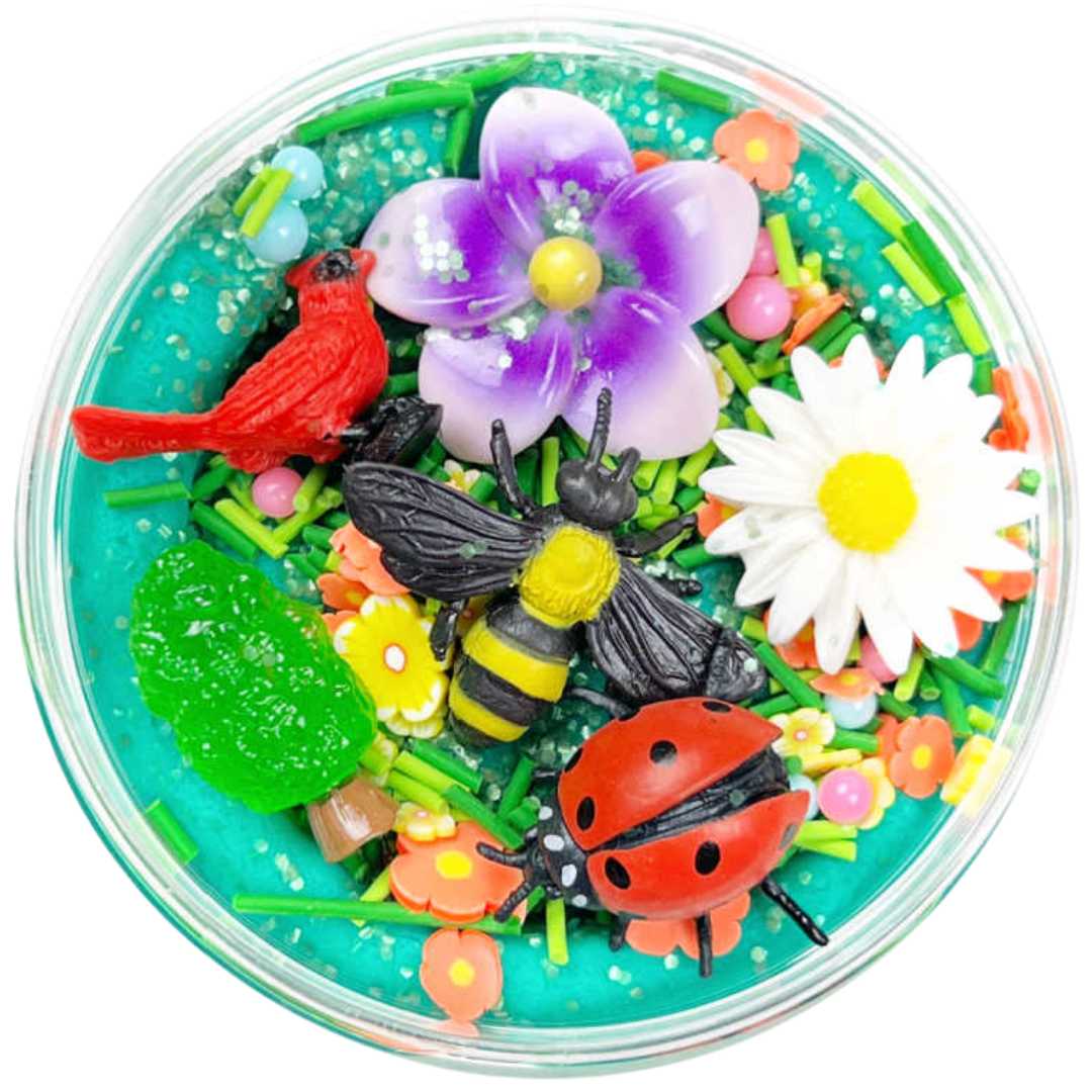 invitation to imagine speelklei surprise pot 'Garden Friends' met een rode vogel, bij, lieveheersbeestje en bloemen in glitterende klei.