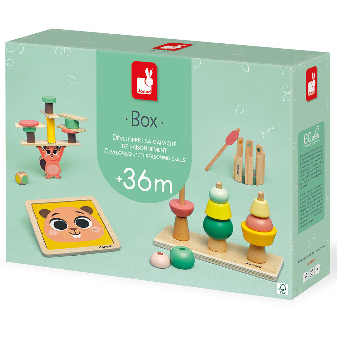 De verpakking van de Janod 4-in-1 activiteitenbox voor kinderen vanaf 3 jaar.