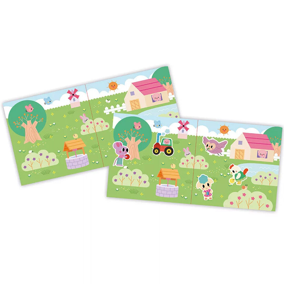 Twee schuin geplaatste open stickerboeken met boerderijlandschappen en dierenstickers.