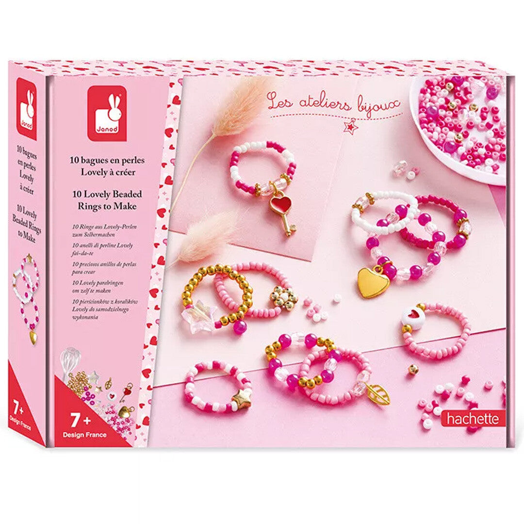Janod verpakking van een set om parelringen te maken met roze en witte kralen en hartjes.