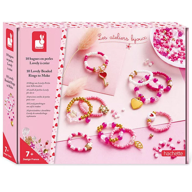 Janod verpakking van een set om parelringen te maken met roze en witte kralen en hartjes.