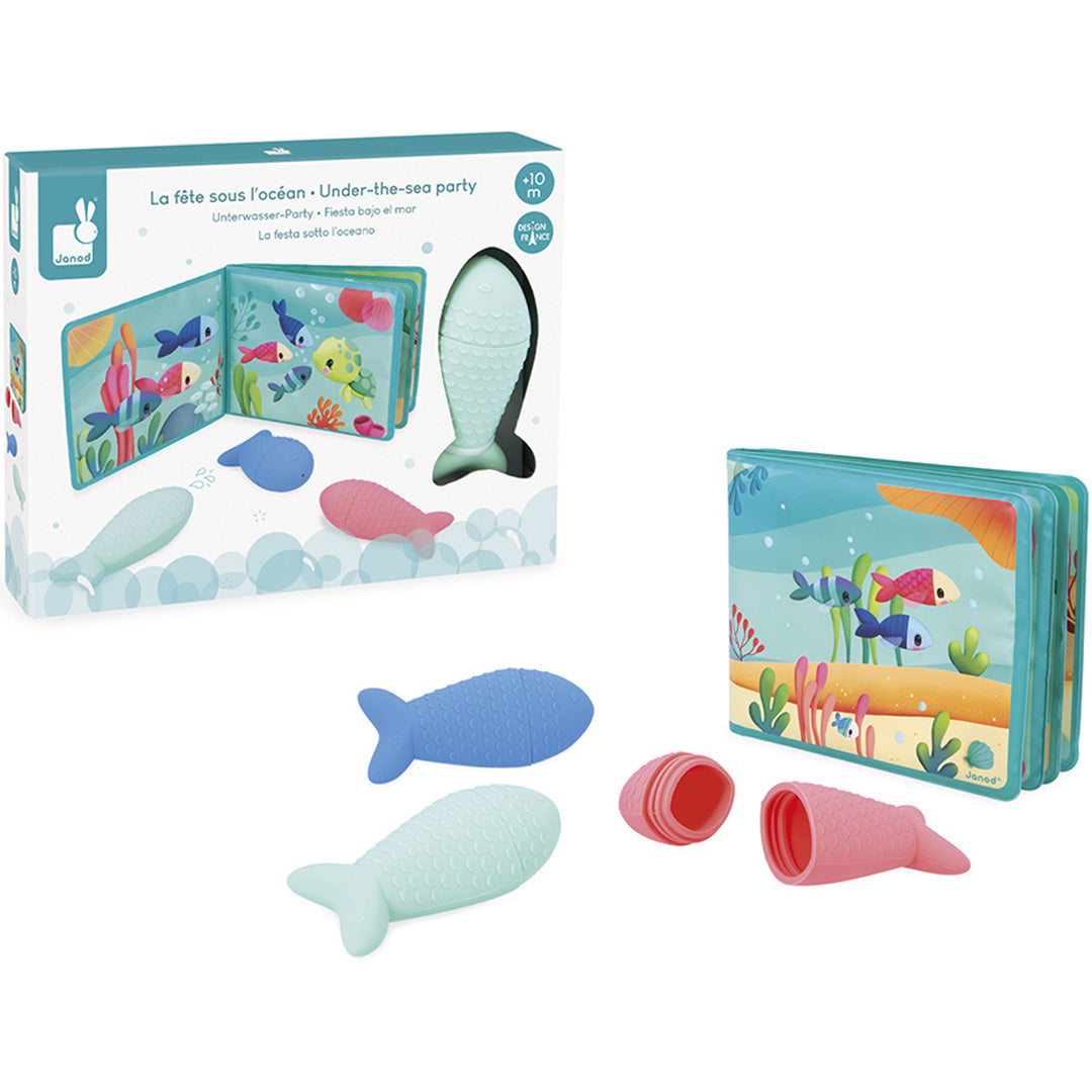 Janod badspeelgoed set met verpakking, een badboekje en drie visvormige spuitfiguurtjes.