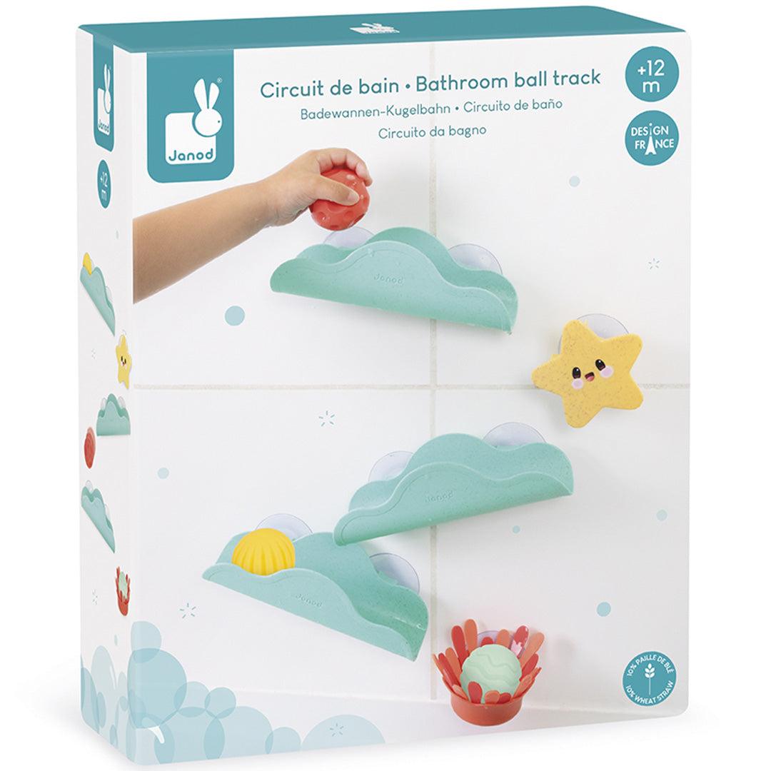 De voorkant van de Janod badspeelgoed ballenbaan verpakking, met een kind dat met de ballenbaan speelt.