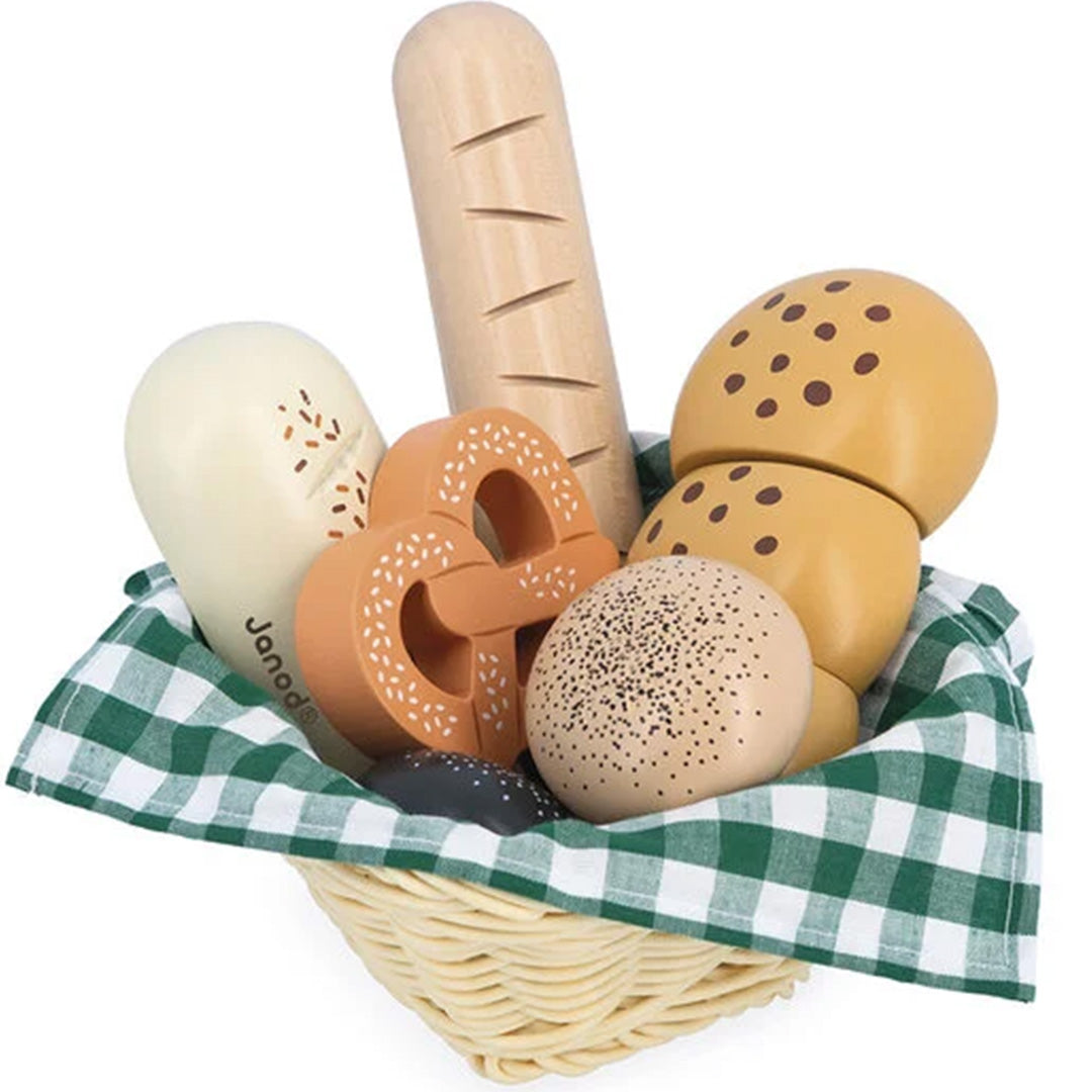 Janod houten speelgoed broodmandje gevuld met diverse broodjes en een stokbrood, liggend in een geruite doek.