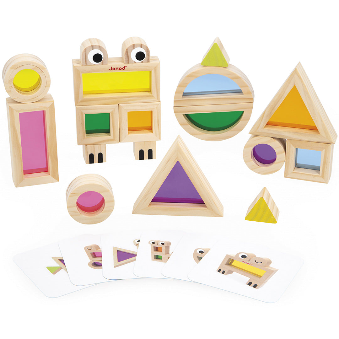 Janod houten transparante blokken opgebouwd tot een kikkerfiguur en andere geometrische vormen, met voorbeeldkaarten.