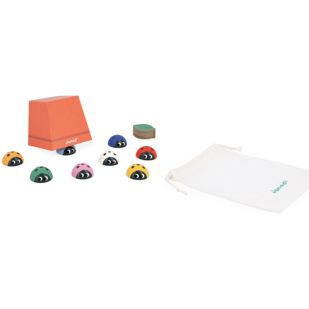 Janod houten geheugenspel met lieveheersbeestjes, een rode doos, groene blaadjes en een witte opbergzak.