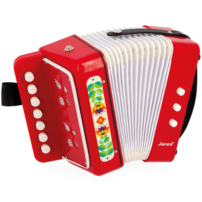 Janod rood speelgoedaccordeon met witte knoppen en een kleurrijk bloemenpatroon.