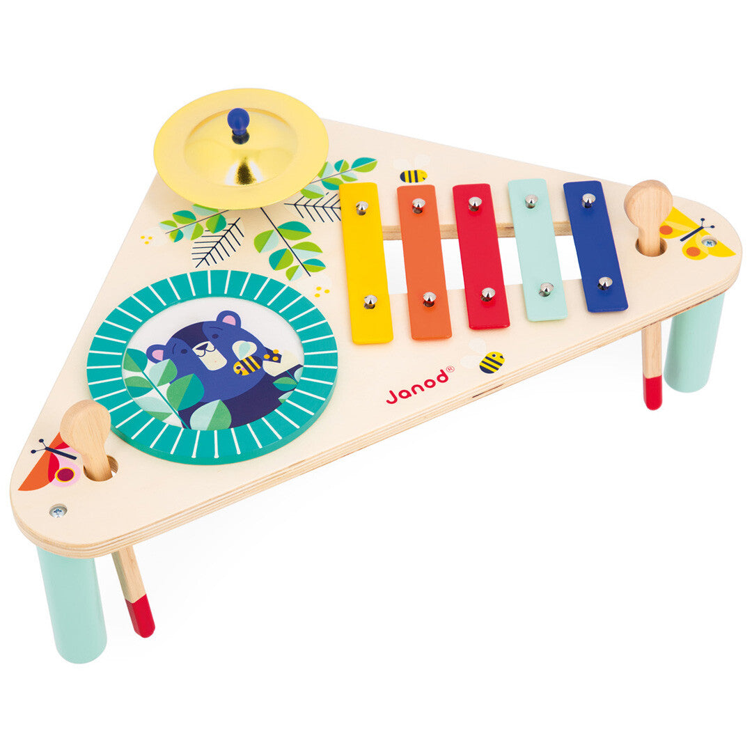 Janod Gioia houten muziektafel met xylofoon, trommel en cimbaal, versierd met dieren en bladeren.