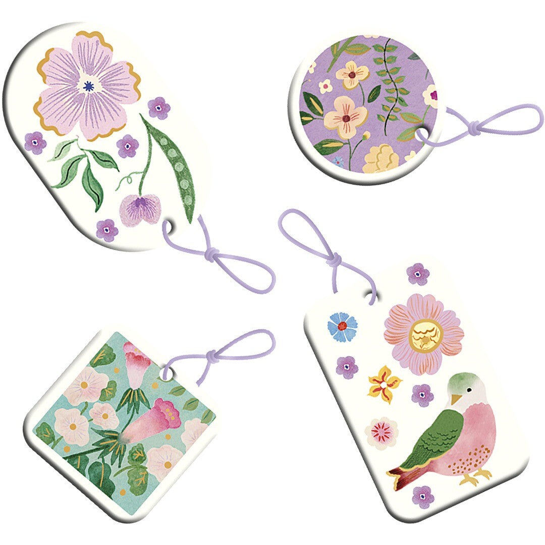 Vier kleine Janod gipsen hangers met bloemen, een vogel en een slak.
