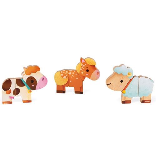 Janod magnetisch speelgoed van drie houten boerderijdieren: een koe, paard en schaap.