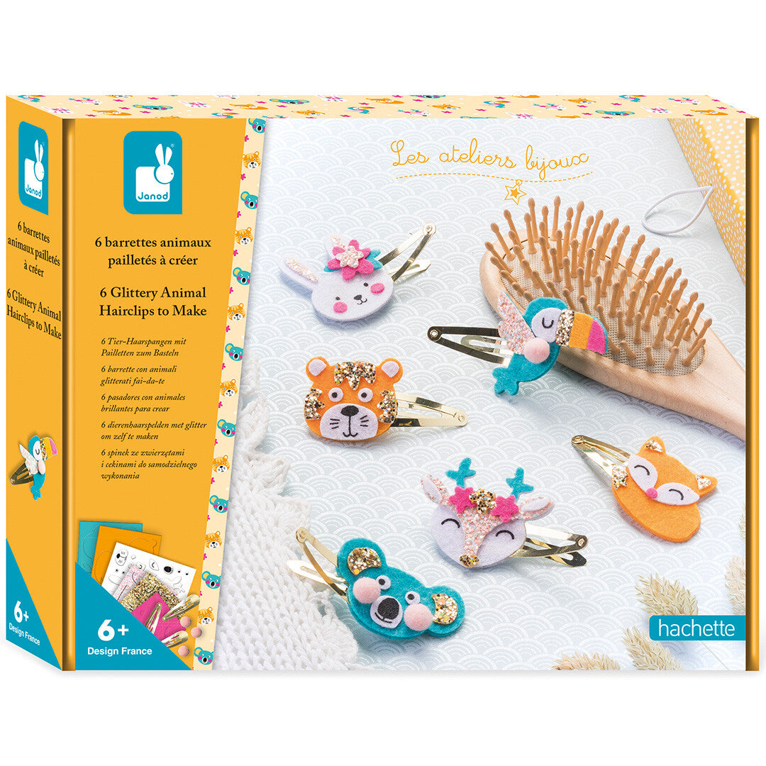 Janod knutselset voor het maken van glitter dieren haarclips, met de verpakking en voorbeelden van de haarclips.