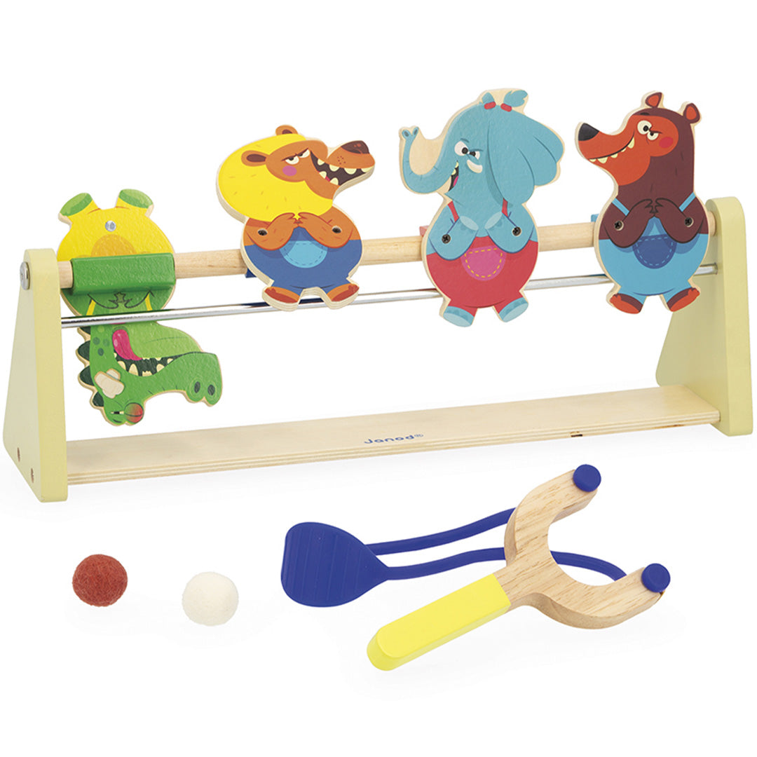 Janod behendigheidsspel met houten katapult, twee vilten ballen en een standaard met vier draaiende dierenfiguren.