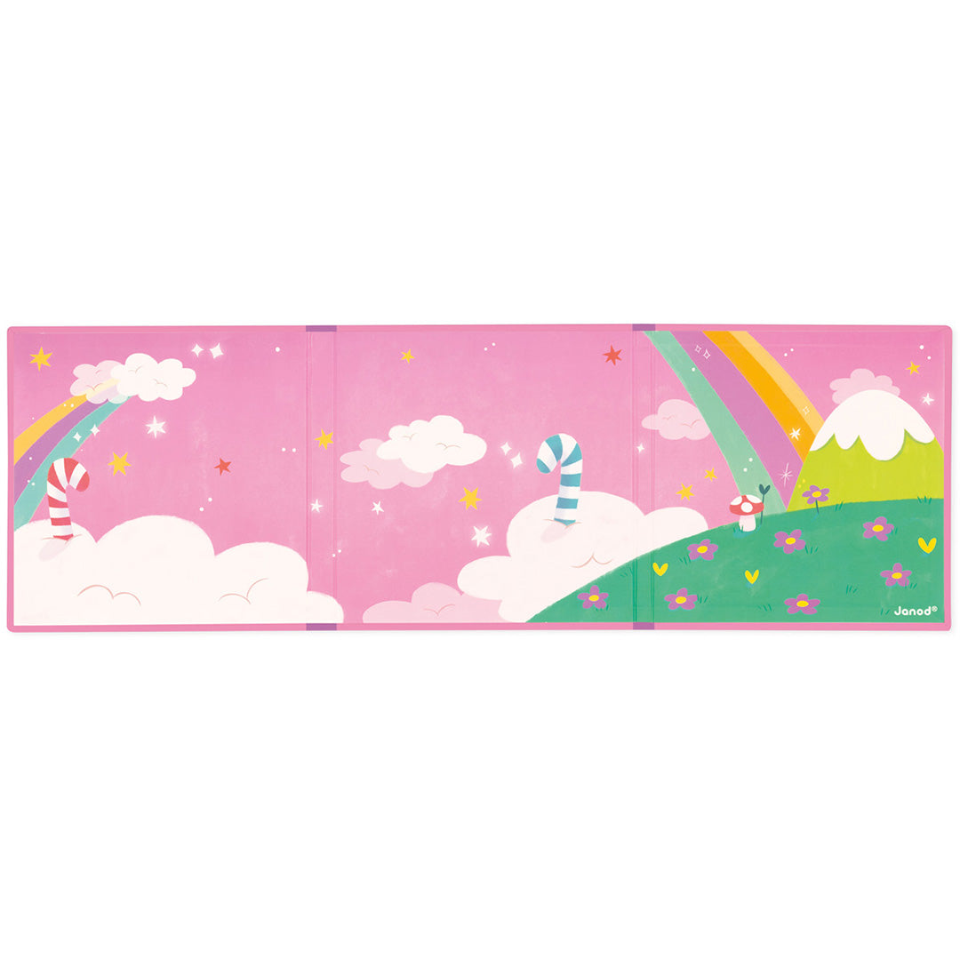 Het open Janod Magnéti'stories eenhoorn magneetboek toont een roze fantasielandschap met wolken en regenbogen.