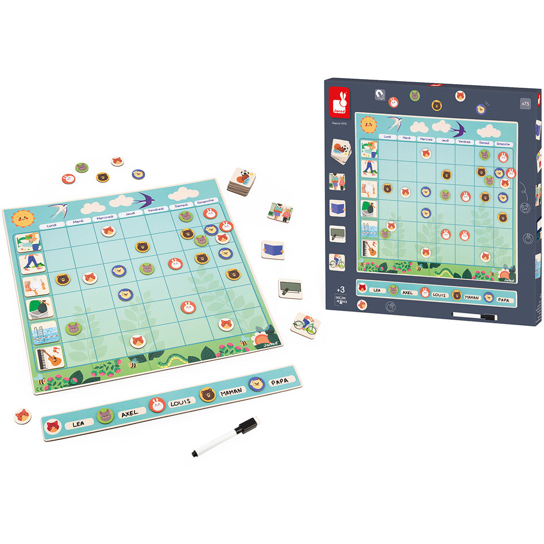 De Janod magnetische weekplanner set met het bord, alle magneetjes en de donkerblauwe productdoos.