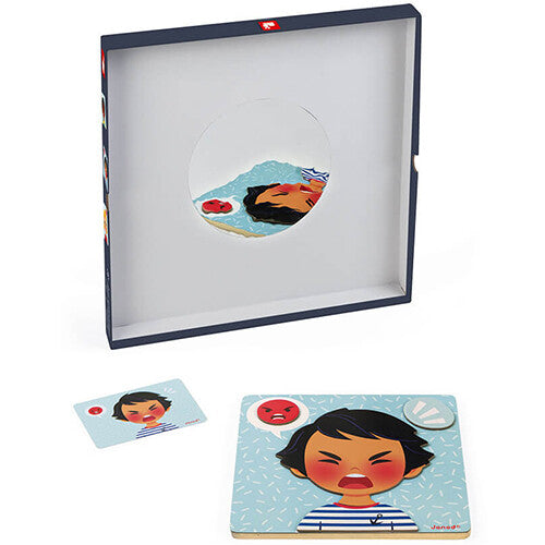 Open doos van het Janod magneetspel emoties met een boze jongen op een magneetbord en een bijpassende kaart.
